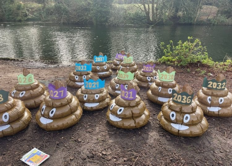 Inflatable poop emojis in Thames Water protest