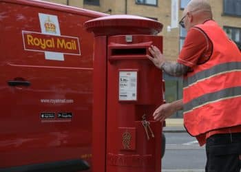Royal Mail van, postbox and postal worker
