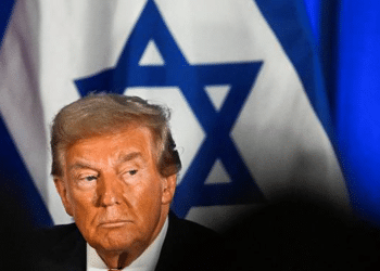 Trump pictured in front of an Israel flag