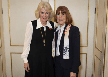 queen camilla stands with gisele pelicot