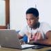 Image of young person working on a laptop Illustrating unemployed young people