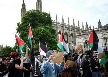 Palestine flags wave in front of King's College Chapel Cambridge. ICJP letter to universities over surveillance.