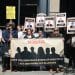 Activists outside the Drax AGM, calling attention to the absent board members
