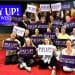 Equity members hold placards supporting the union's Pay Up! campaign in London's West End