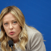 Italy Prime Minister Giorgia Meloni speaking into a microphone