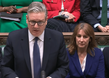 Keir Starmer stands to speak at PMQs on 22 April 2026