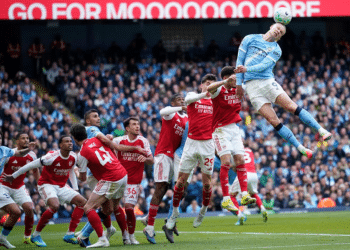 Manchester City's Erling Haaland heads the ball during the English Premier League soccer match between Manchester City and and Arsenal, in Manchester, England, Sunday, April 19, 2026.