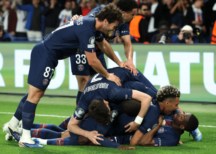 Ousmane Dembélé celebrates scoring his team’s fifth goal with his PSG teammates but Bayern roared back to keep the tie alive. Photograph: Alexander Hassenstein/Getty Images