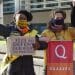Protesters hold banner saying Quakers For Peace and placard saying 811,833 Say Defend Our Right To Protest. Faith leaders criticise protest bill.