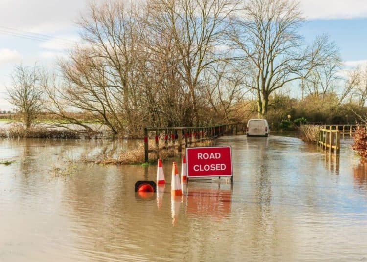 Flooded road illustrating VoteClimate voting tool