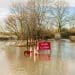Flooded road illustrating VoteClimate voting tool