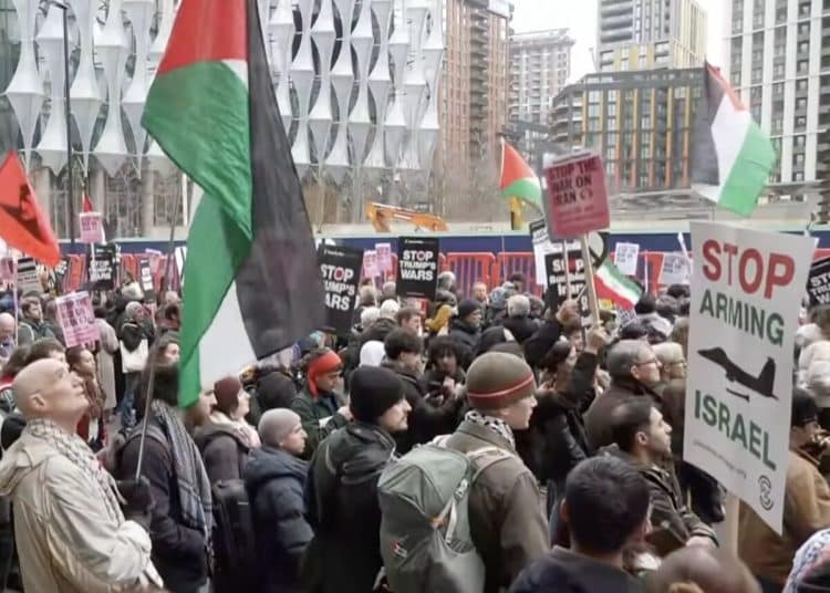 Iranians gather outside Downing Street protesting Iran War