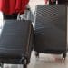 People dragging suitcases More young Britons leaving the UK