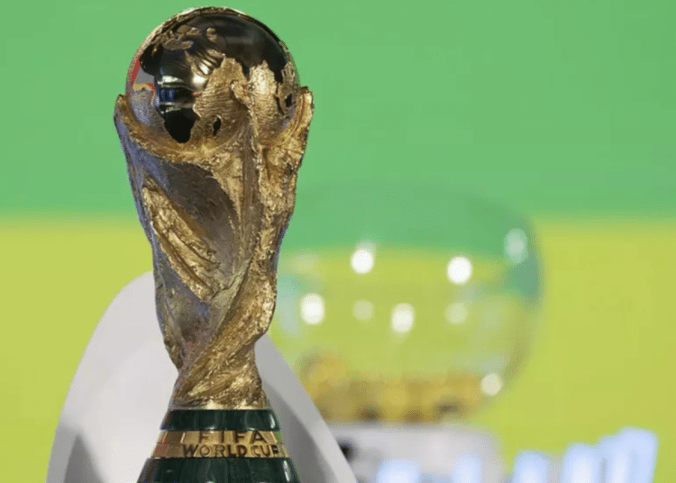 The World Cup trophy shines against a colourful background