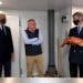 Richard Drax MP, the restaurant owner and Jacob Rees-Mogg holding a lobster