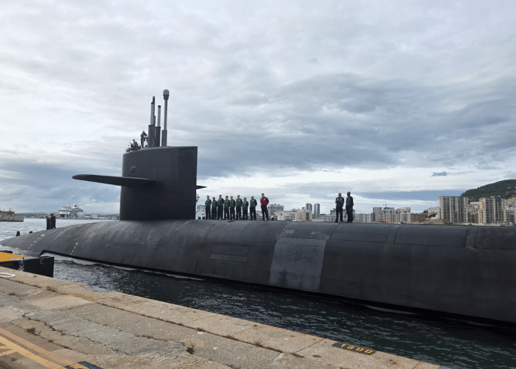 People stand on top of a US Navy Ohio-class ballistic missile submarine that arrived in Gibraltar on 10 May 2026. The Pentagon released its location.