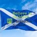 Composite image of Barnardo's Scotland logo over Scotland flag
