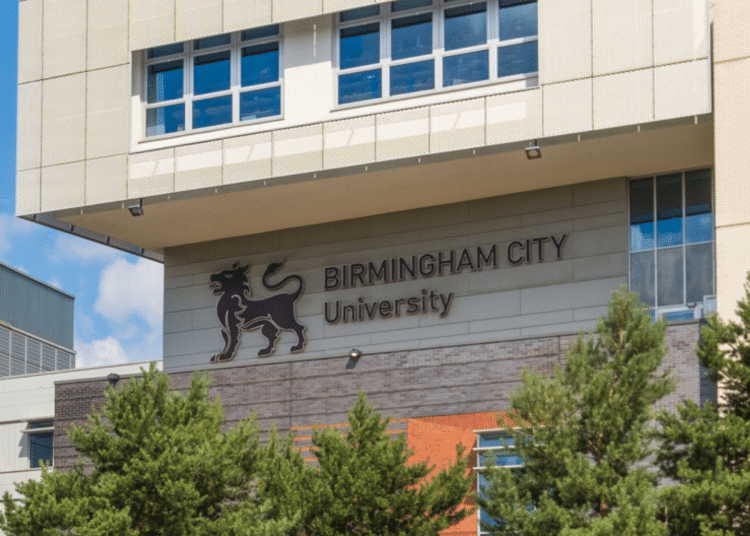 The Birmingham City University (BCU) logo on the side of one its buildings