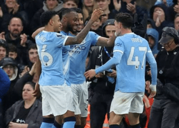 Semenyo, Marmoush and Foden celebrate a goal for City