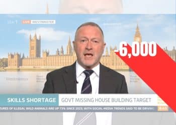 Steve Reed in front of text which reads '-6,000' Labour