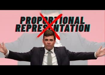 Andy Burnham with his arms out
