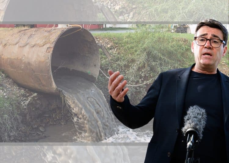 Andy Burnham in front of a sewage pipe
