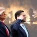 Donald Trump and JD Vance in front of flaming wreckage