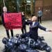 'Body bags' and an 'oil executive' outside the office of Equinor. A banner says Equinor War Profiteers #StopRosebank