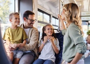 A family on a bus Summer Savings
