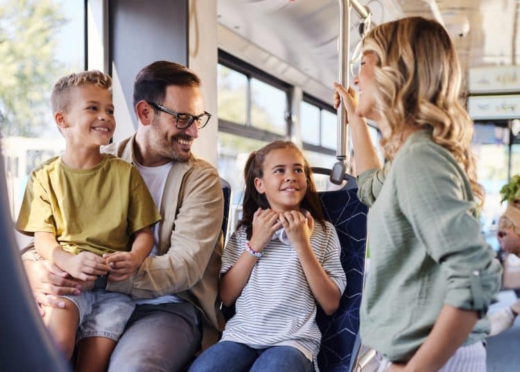 A family on a bus Summer Savings