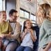 A family on a bus Summer Savings