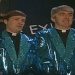 Fathers Ted and Dougal wear garish sparkly blazers over their black robes for Eurovision