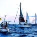 Global Sumud Flotilla boats sailing at twilight