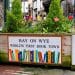 Sign on a planter says Hay On Wye World's First Book Town Hay Festival Airbnb