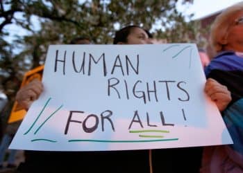 Protest placard reading Human Rights For All