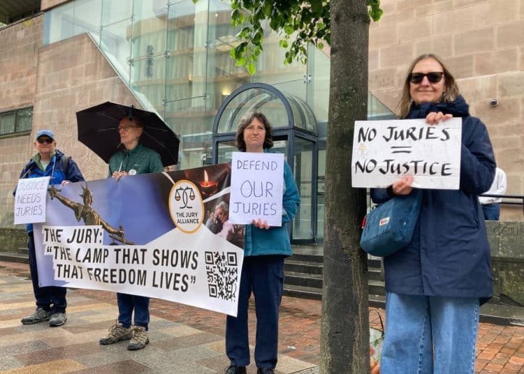 Jury Alliance supporters outside a crown court