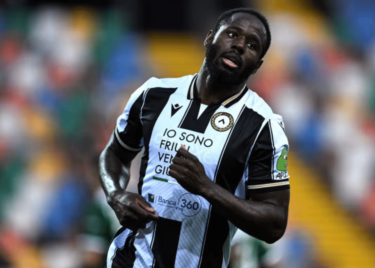 Keinan Davis sports the Udinese kit on the pitch