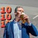 Keir Starmer drinking a pint in front of text which reads '£10'
