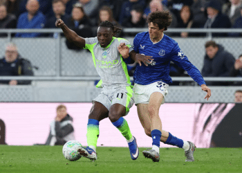 Man City's Jeremy Doku in action with Everton's Merlin Rohl