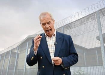 Nigel Farage in front of a detention centre, Reform