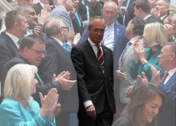 Nigel Farage in the middle of a group of councillors