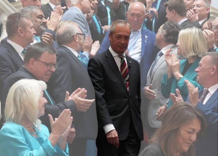 Nigel Farage in the middle of a group of councillors