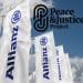 Composite image with the Peace & Justice Project logo added to a picture of Allianz logo flags