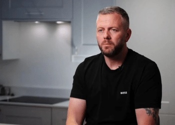 Robert Kenyon, Reform's candidate in the Makerfield by-election, sat at a kitchen counter