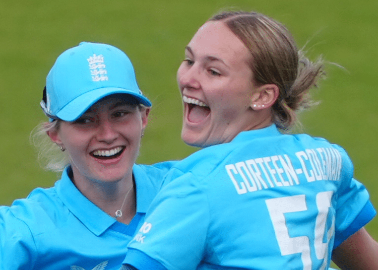 Tilly Corteen-Colemnan taking wickets and laughing during a game with a team mate