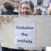 Tony Greenstein holding the 'Globalise the Intifada' slogan poster at the Nakba Day march in London on 16 May 2026