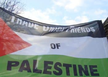 A Palestine flag with the words Trade Union Friends Of Palestine Trade unions to mark Nakba Day