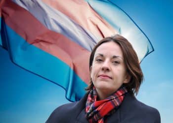 Composite image of new Stonewall chair Kezia Dugdale in front of a trans pride flag