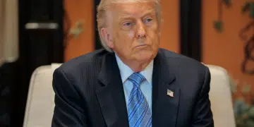 Donald Trump sat down in a suit looking unimpressed