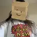 Zöe Bread wearing a sliced white bread mask and a comic style slogan tshirt saying, 'I'm the council now'.